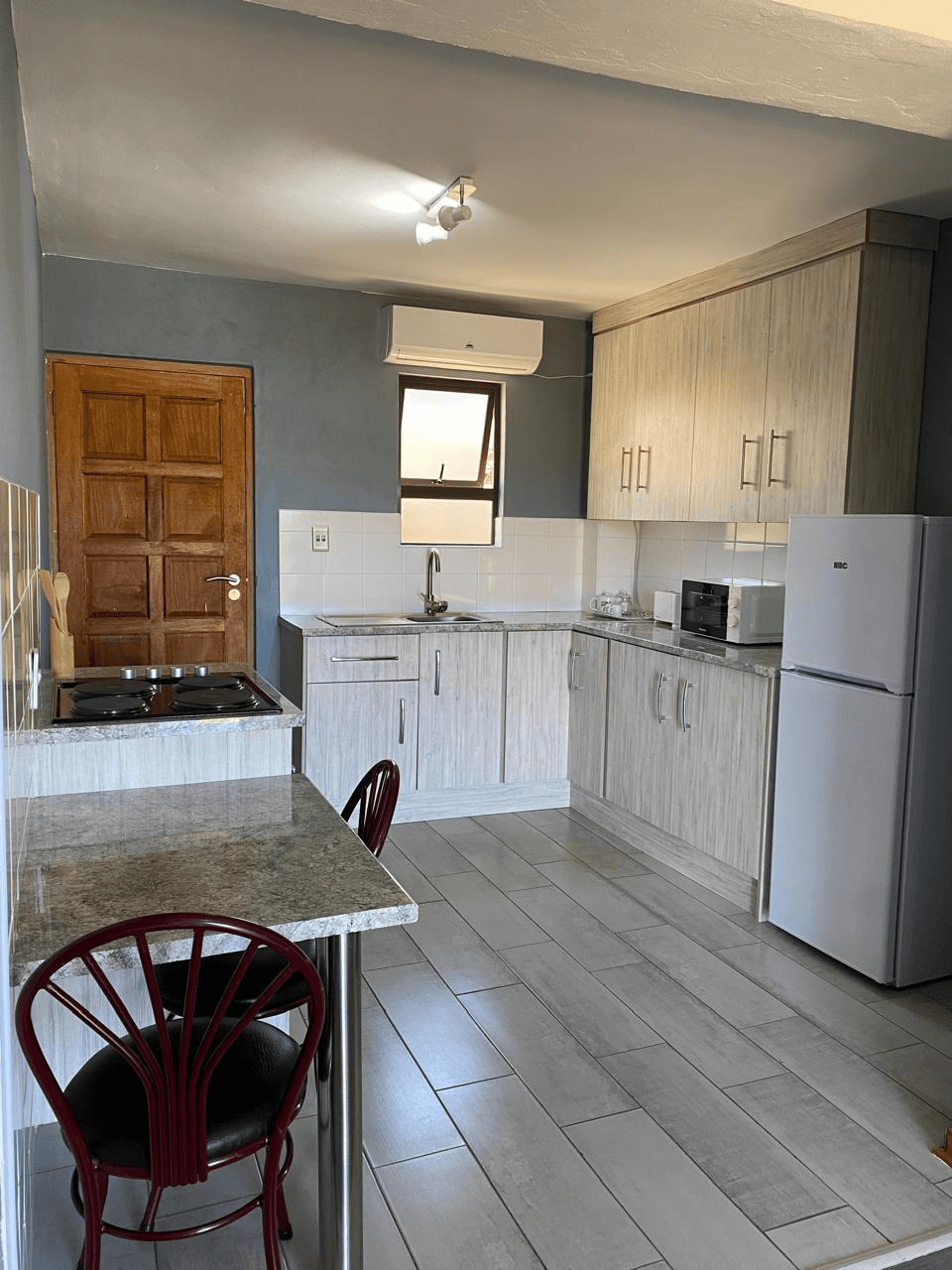 Self Catering — living area with lounge furniture